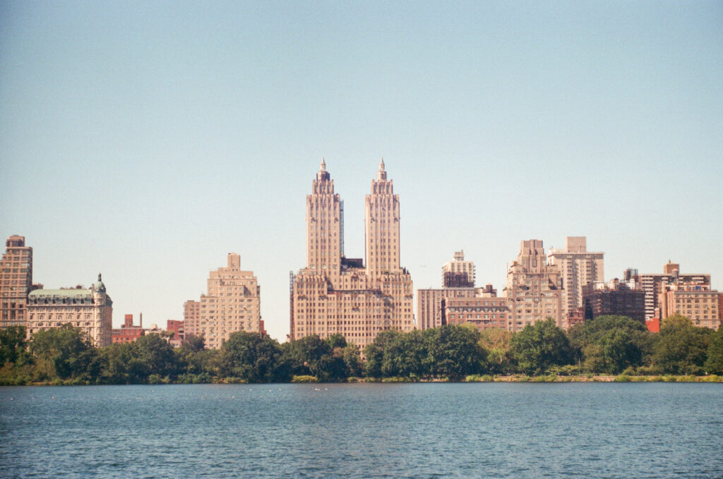 view of the Jacqueline Onassis reservoir in central park facing west shot on film