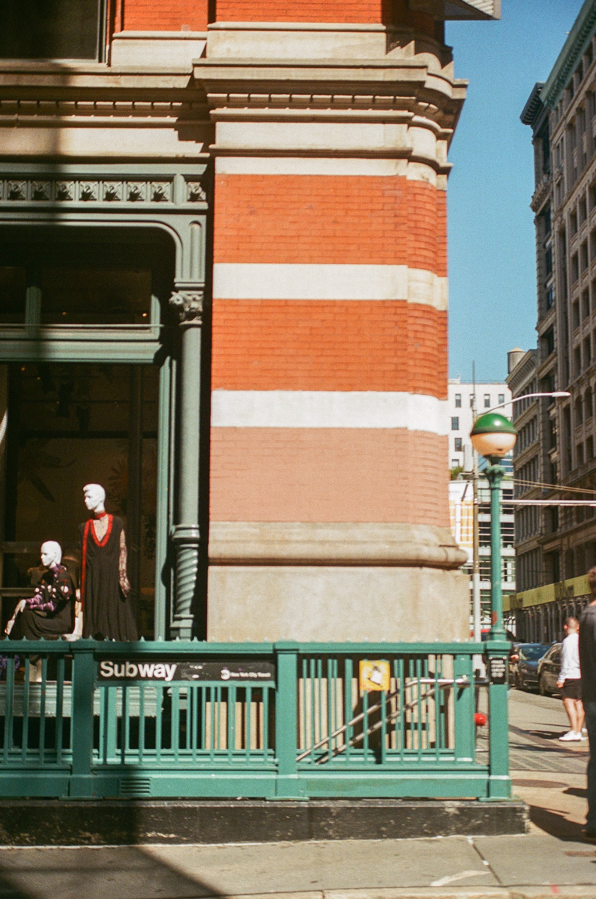 subway entrance in front of prada building in soho nyc shot on film